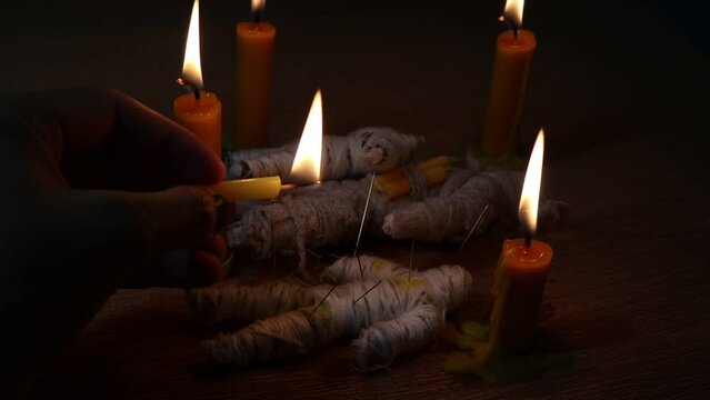 Candle light in the dark and curse doll, candle light ceremony