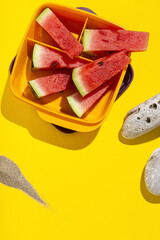 Fresh watermelon slices with sunlight on box container