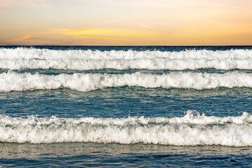 waves breaking in a row