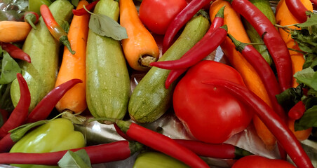 Different vegetables. The concept of healthy eating. Tomatoes, zucchini, carrots, peppers. View from above. Vitamins. Diet. Agriculture