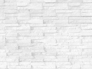 Seamless texture of white grey brick stone wall a rough surface, with space for text, for a background.