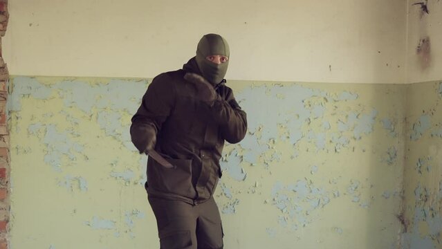 Special Forces soldier demonstrates knife skills. Knife fighting and self-defense with a knife.