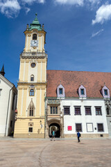Fototapeta na wymiar Old Town Hall at the main square in Bratislava on a sunny day