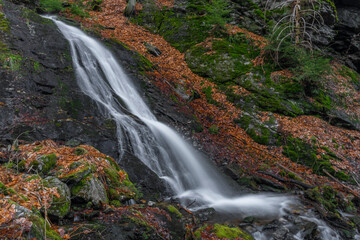 Prudky rucej creek with waterfall near confluence with Jizera river