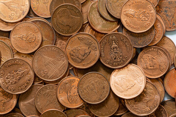 Macro baht coin,Macro coin,Double Exposure of Coins ,Piles of coins on the table. Coins side view. Coins macro shot,Money thai coins background. Various coins used in Thailand