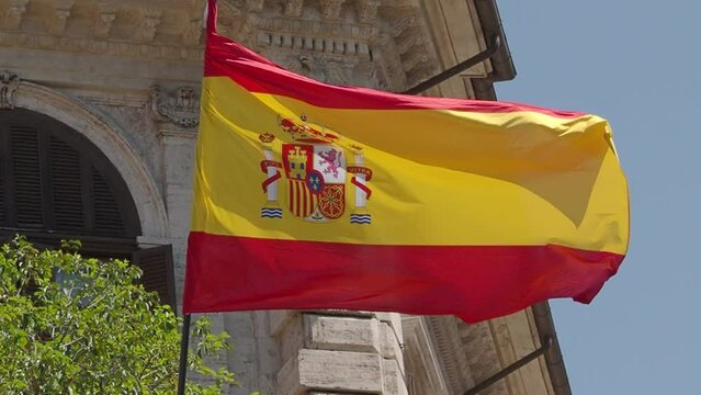 The national flag of Spain, three horizontal stripes: red, yellow and red
