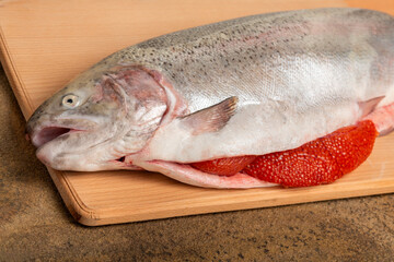 whole raw atlantic salmon with caviar