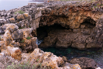 Fototapeta na wymiar Gorge in the rocks above the ocean