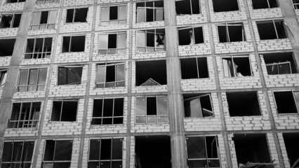 A new residential building was damaged by the explosion of a Russian hypersonic missile, black and...