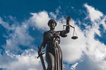 statue of justice against the sky in city Krasnoyarsk, Russia