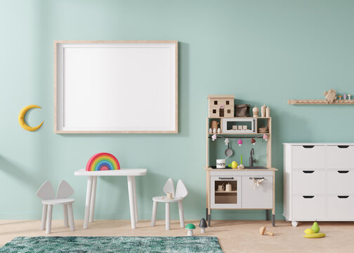 Empty horizontal picture frame on mint blue wall in modern child room. Mock up interior in scandinavian style. Free, copy space for picture. Table with chairs, toys. Cozy room for kids. 3D rendering.