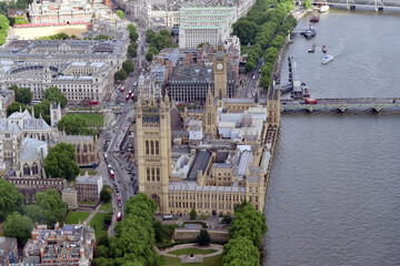 London Houses of Parliament with world famous Big Ben clock taken from helicopter
