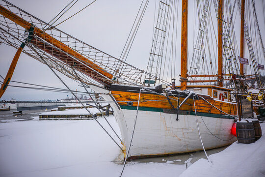 Sailing vessel on the water at Helsinki jetty on winter day, Finland