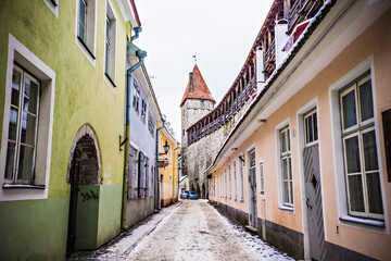 Fototapeta na wymiar Old town of Tallinn, old narrow streets and ancient buildings. Medieval architecture of Tallinn old town, Estonia