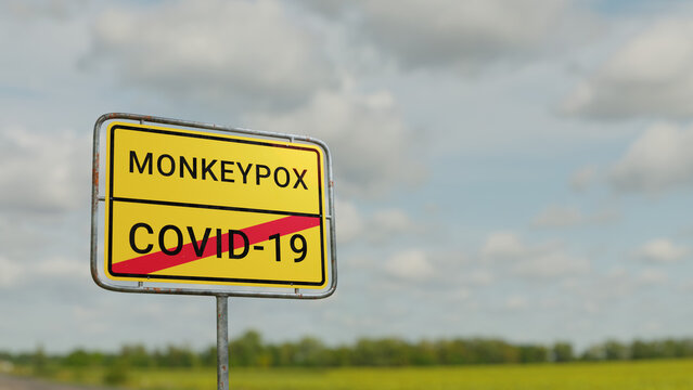 3d render of a road sign reading "MONKEYPOX - COVID-19"