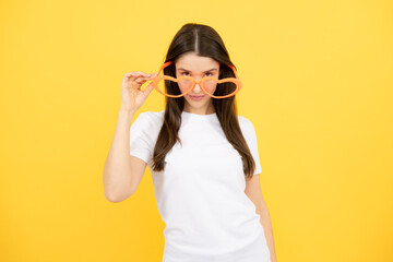 Surprised woman, shocking girl wearing funny glasses on isolated yellow background, Wow face...