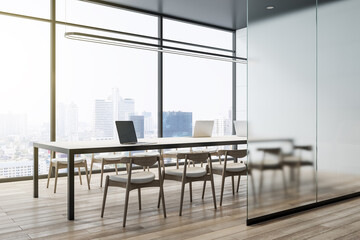 Side view on modern conference table with chairs in stylish meeting room with matt glass wall, city view from huge window and wooden floor. 3D rendering