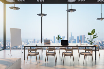 Sunny spacious with great city view from glass wall office area with huge wooden conference table in the center of room, modern laptop on table, wooden chairs, green plant in white pot. 3D rendering