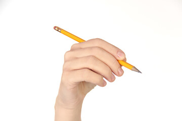 Woman hand holding yellow pencil isolated on white background