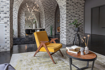 modern luxury design of a brutal apartment interior with arches in the style of a medieval castle with bright accents. free layout, kitchen area, seating and eating area.