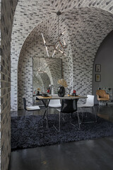 modern luxury design of a brutal apartment interior with arches in the style of a medieval castle with bright accents. free layout, kitchen area, seating and eating area.