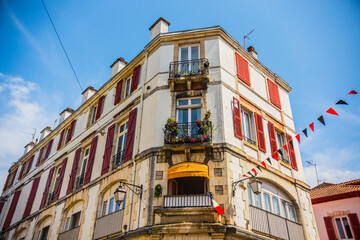 Traditional house in St. Jean de Luz, Basque Country, France. Colorful houses and narrow streets at...