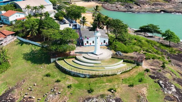 Tropical landscape of Santa Luzia Lighthouse at coast city of Vila Velha Vitoria state of Espirito Santo Brazil. Vacation travel destination. Famous Santa Luzia lighthouse at Vitoria Espirito Santo.