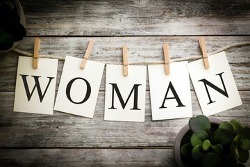 The Word WOMAN Concept Printed on Cards