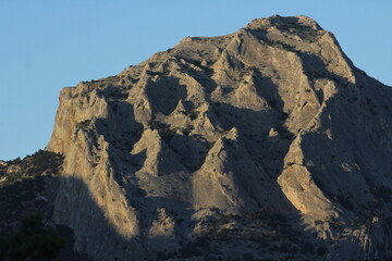 Mountains at sunset on the coast of the New World in Crimea. Trail of Prince Golitsyn