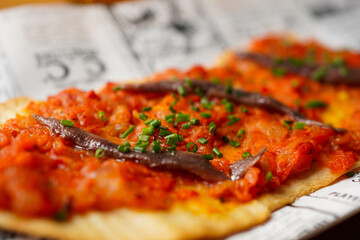 Closeup of Coca de escalivada con anchoas, Spanish tapas 