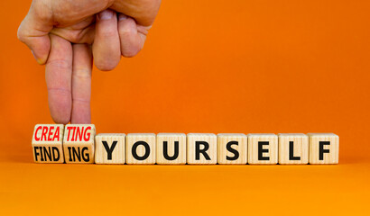 Finding or creating yourself symbol. Businessman turns wooden cubes and changes words Finding...
