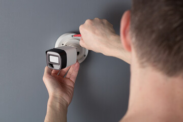 CCTV Installation specialist concept. Service for installing CCTV cameras. Security cameras in the...