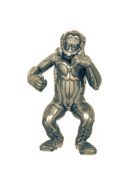 chimpanzee astronaut is doing a dominant pose in white background