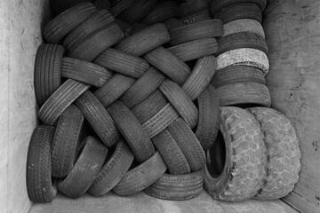 a mixture of old tyres stacked and stapled together