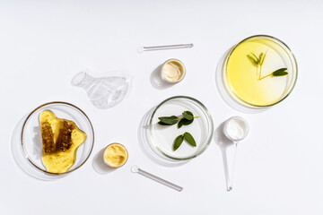 Alternative natural medicine and glassware, flasks and petri bowl. Alternative medicine herbs....