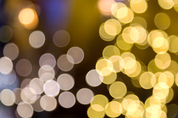 Gold and White Bokeh Lights on a City Night Background