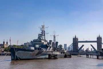 Tower Bridge of London and HMS warship