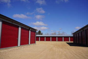 Red storage unit buildings site outside of Fond du Lac, Wisconsin holding owers property.
