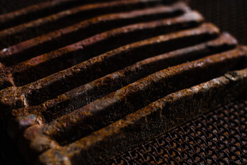 close up of a rusty metal grill