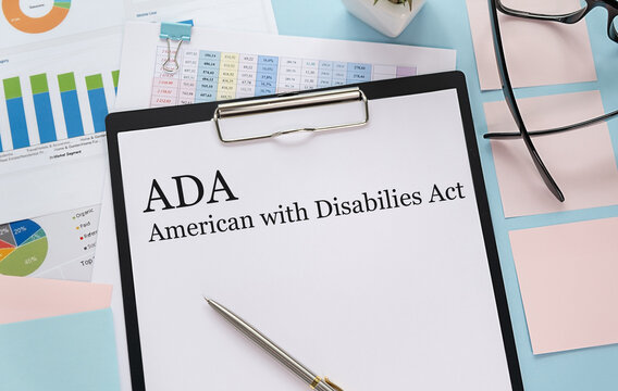 Paper with Americans with Disabilities Act ADA on a table