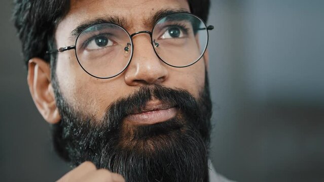 Close-up portrait arab thoughtful pensive business man has question dilemma concentrated think of solution issue focused on thoughts memories puzzled adult guy with bad memory search for inspiration