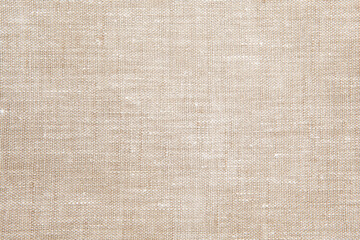 Textured background from natural linen fabric, natural color. 