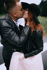 funny wedding couple outdoor.Stylish wedding couple portrait 