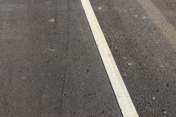 white line on asphalt road