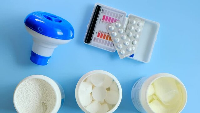 Water quality check. Pool cleaning set. Chlorine tablets,blue plastic filter, ph tests for water.Pool cleaning system. 4k footage