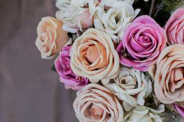 Beautiful Garden roses with a vintage vibe.  Flowers on a dark background, soft and romantic. Close-up. 