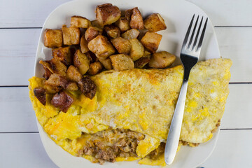 corn beef hash  and cheese omelet with homefries