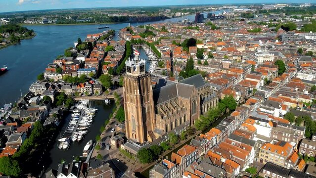 Dordrecht Netherlands, the skyline of the old city of Dordrecht with a church and canal buildings in the Netherlands. High quality 4k footage