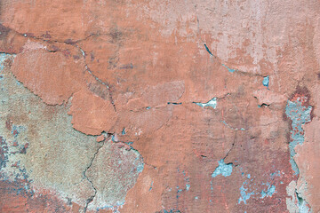 Fototapeta premium Old wall texture with cracked peeling paint. Abstract grunge backdrop
