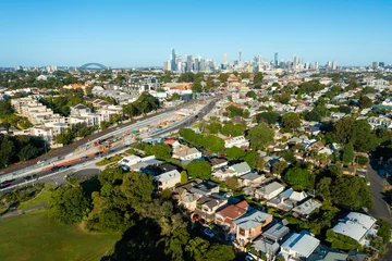 Gordijnen Aerial view of houses in a suburb close to to Sydney CBD in Australia © ymgerman